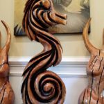 Chainsaw carving of curvy seahorse by SpiritCurves Gregor